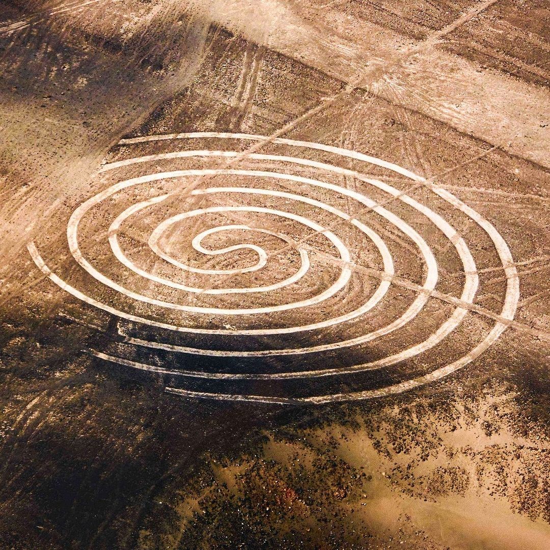 Aerial view of a spiral geoglyph in the Nazca region